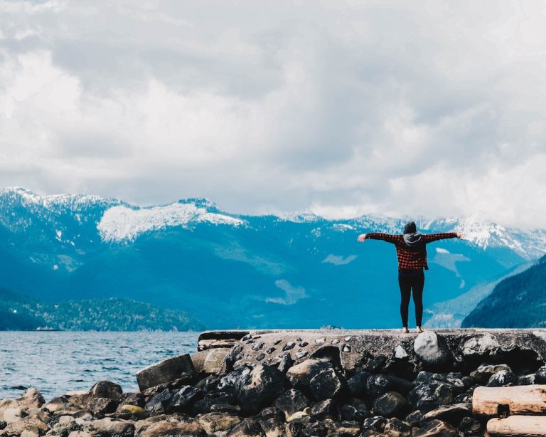 person looking out over a body of water